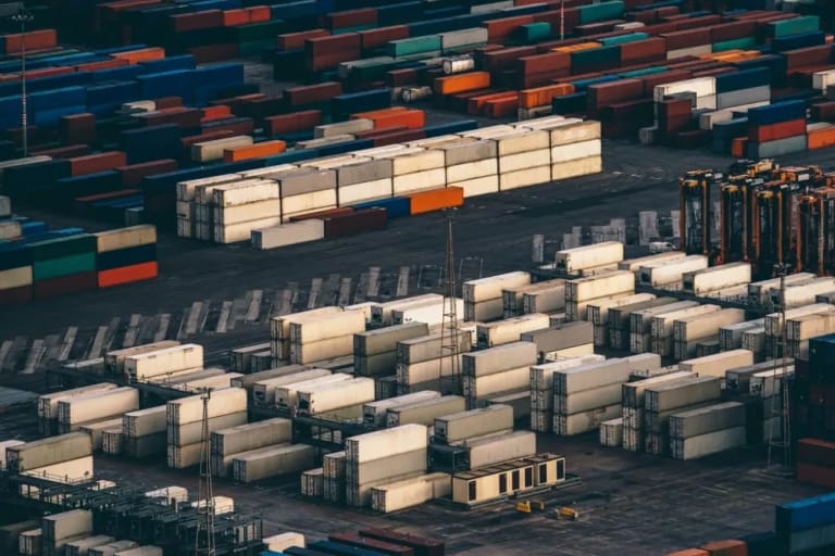 Shipping containers stacked at a port