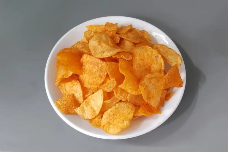 Bowl of spiced potato chips