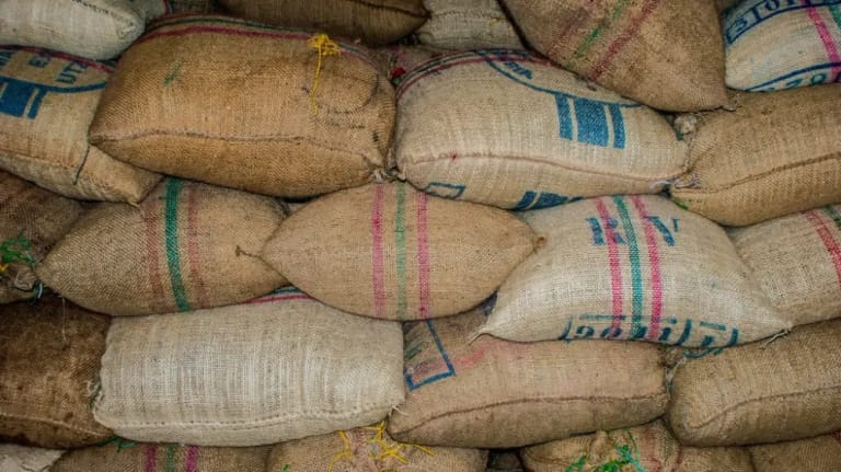 Stacked jute sacks of a traded commodity