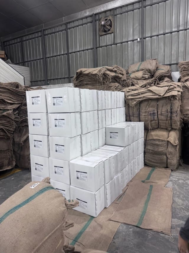 Labelled cartons stacked ready for dispatch